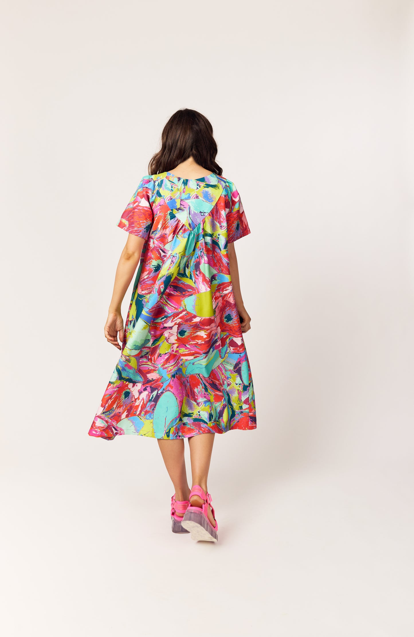Back view of The Debut Dress in Protea Painterly – vibrant, painterly print organic cotton dress, UK-made fashion.